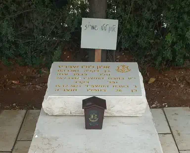 Military headstone placed on grave of accidentally slain hostage