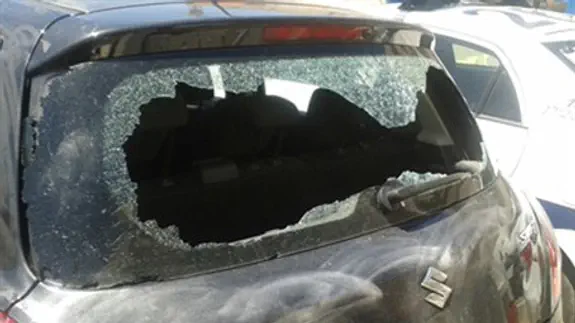 The officer's car after the attack Facebook