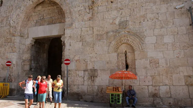 Tourists exist Zion Gate