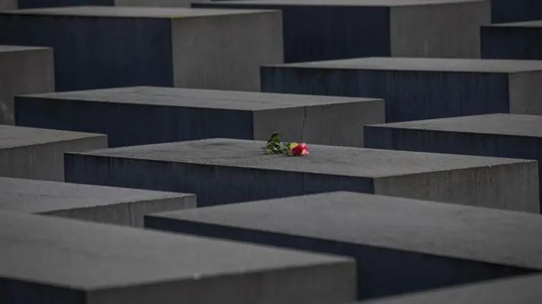 A rose is placed on the Holocaust Memorial in Berlin, Germany.