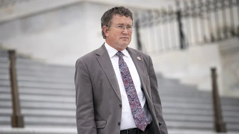 Rep. Thomas Massie, R-Ky., walks down the House steps after a vote in the Capito