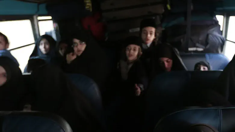 Members of Lev Tahor, traveling by bus
