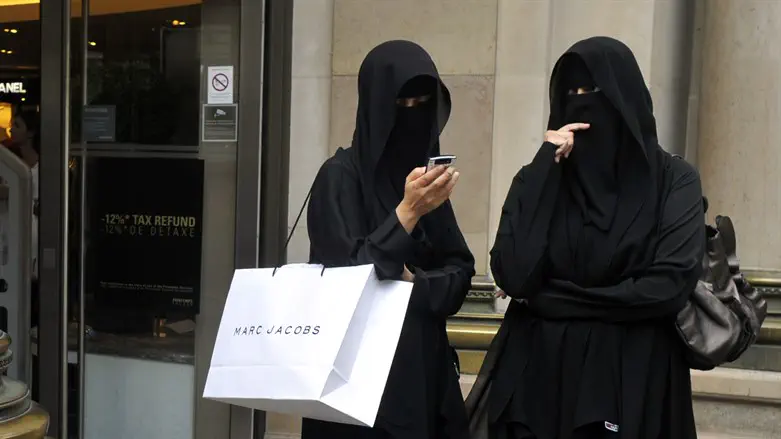 Muslim women in burqa face veils