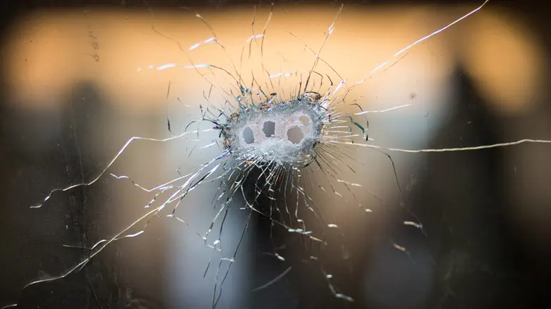 Bullet holes in windshield