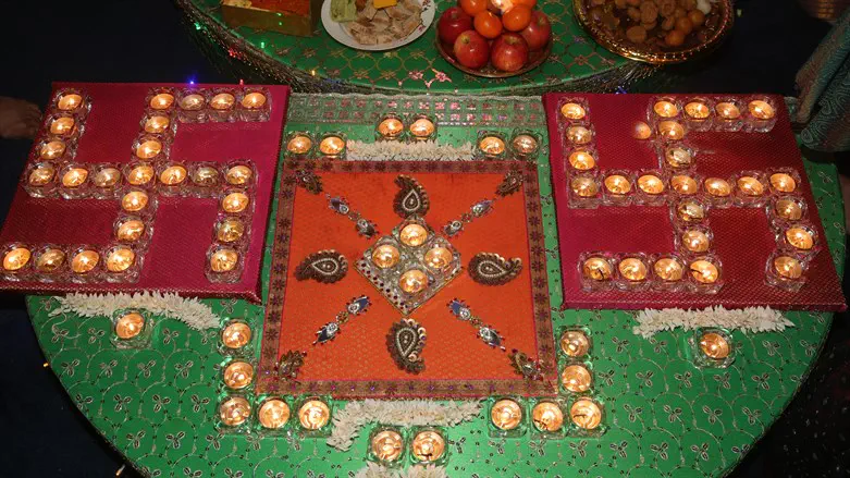 Diyas lamps arranged in swastikas