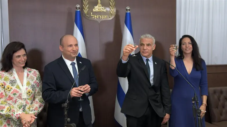 Bennett and Lapid hold handover ceremony