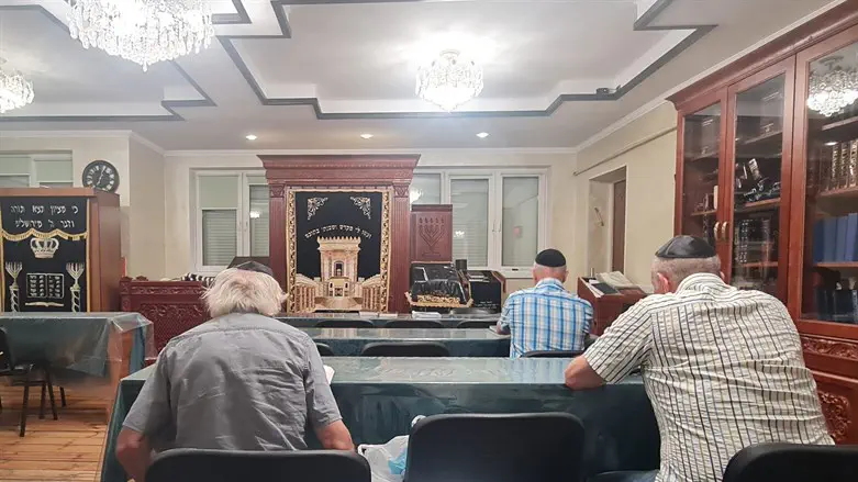 Men pray at a synagogue in Vinnytsia, Ukraine, June 24, 2022.