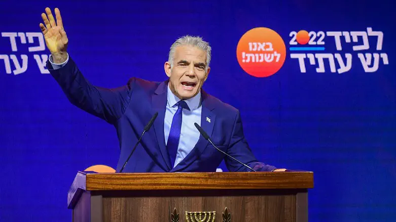 Yair Lapid speaking at a Yesh Atid event