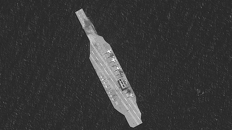Iranian mockup aircraft carrier over Strait of Hormuz