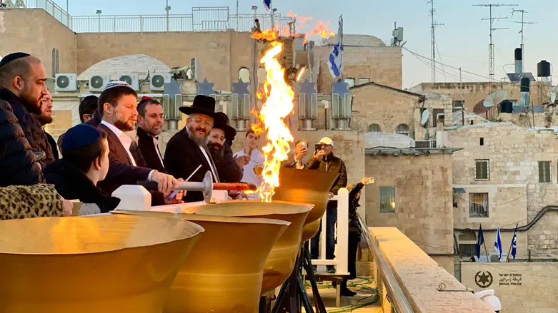 Smotrich lights first candle at Kotel