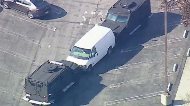 Police surround white cargo van in Torrance