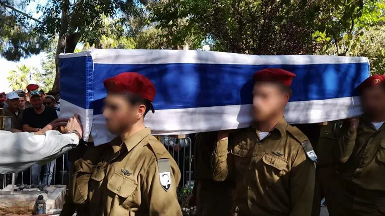 David Yehuda's casket is carried into the cemetary