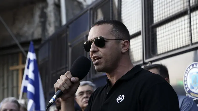 Then-Golden Dawn lawmaker Ilias Kasidiaris at a rally in central Athens, Sept. 2018.
