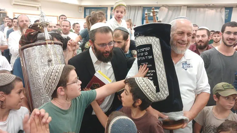 The new scrolls are brought to the Yeshiva
