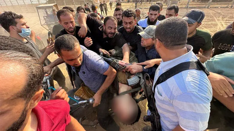Photo by journalist of IDF soldier's body slung over bike