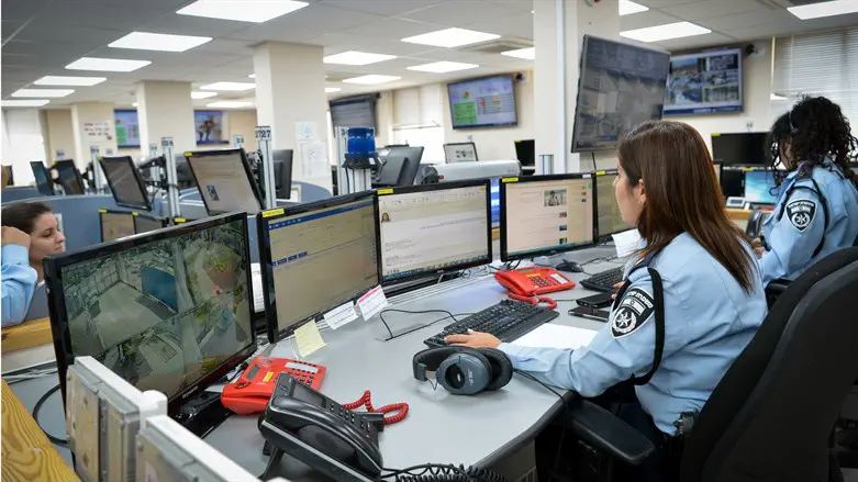 Police officers working at a call center in Holon