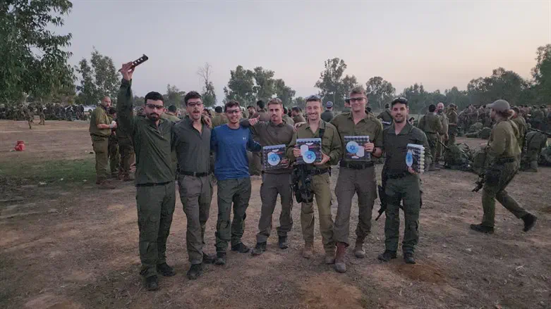  every soldier is lighting a Hanukkah candle