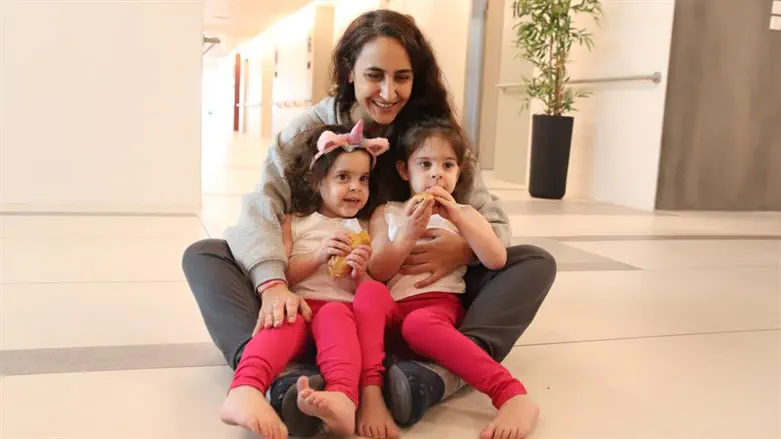 Sharon Aloni Cunio and her daughters after they were freed