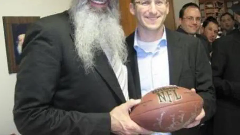 Veingrad at yeshiva, with an NFL football