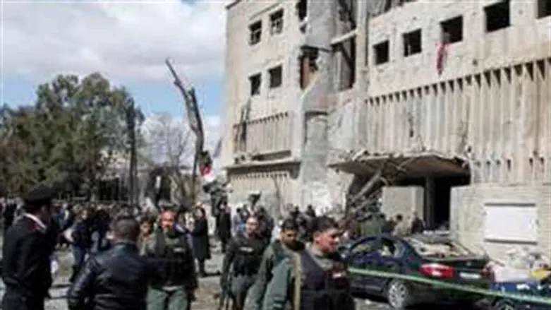 Syrian officials at blast site in Damascus 