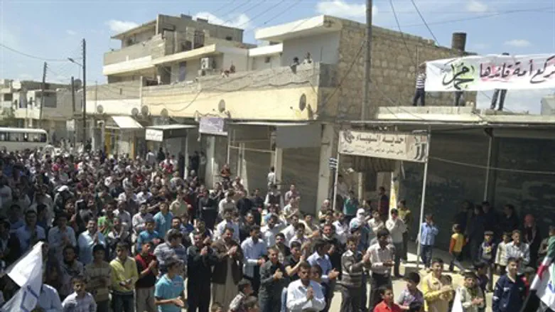 Demonstrators protest near Aleppo
