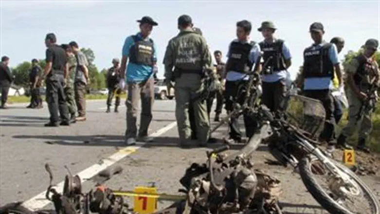Aftermath of motorcycle bombing (illustrative