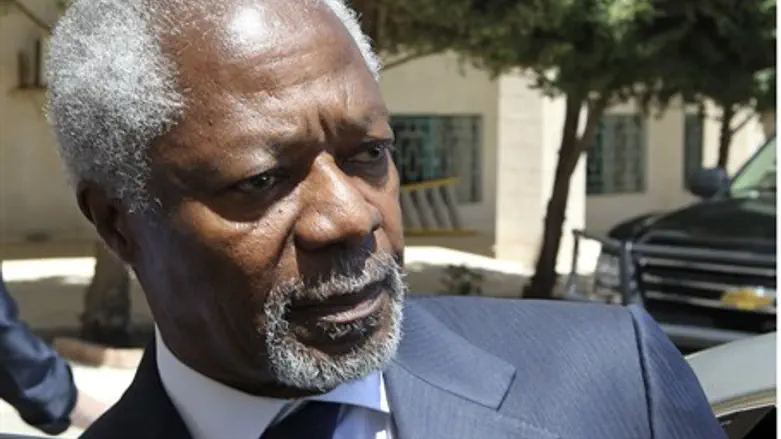 U.N.-Arab League envoy Kofi Annan enters his 
