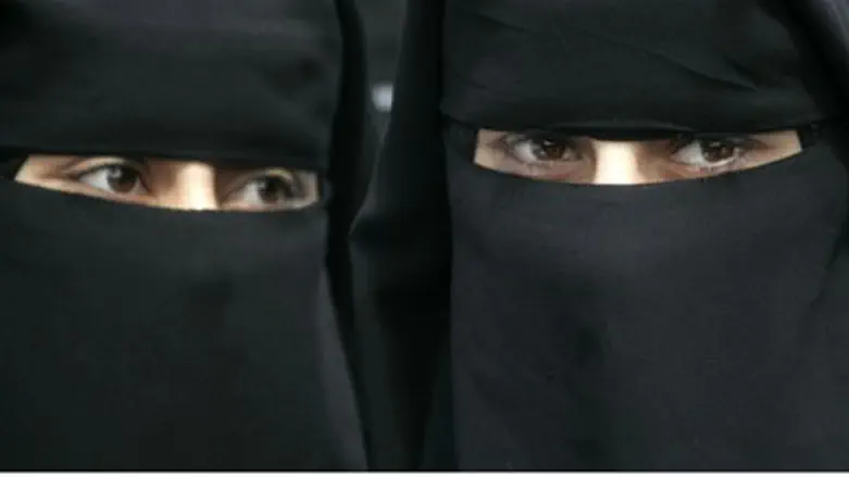 Muslim women wearing niqab
