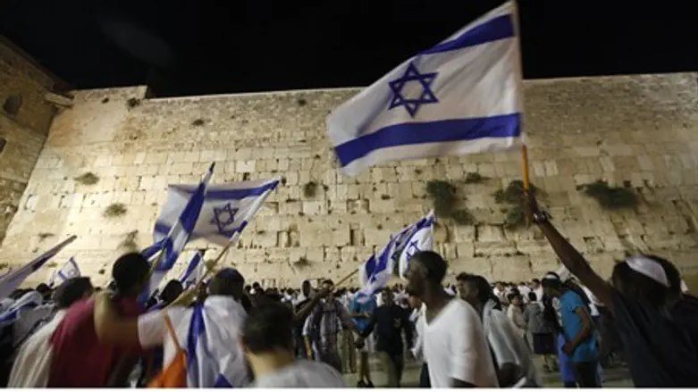 Waving Israeli flags in front of Kotel