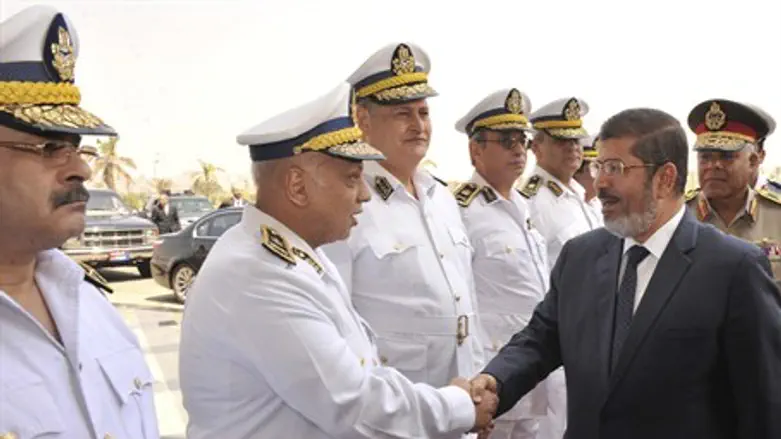 Egypt's president-elect Mursi with police gen