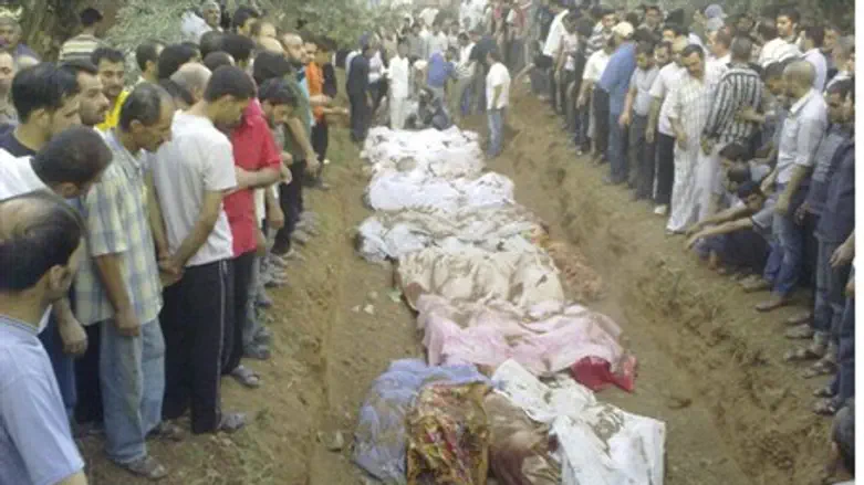 Mass burial of massacre victims near Damascus