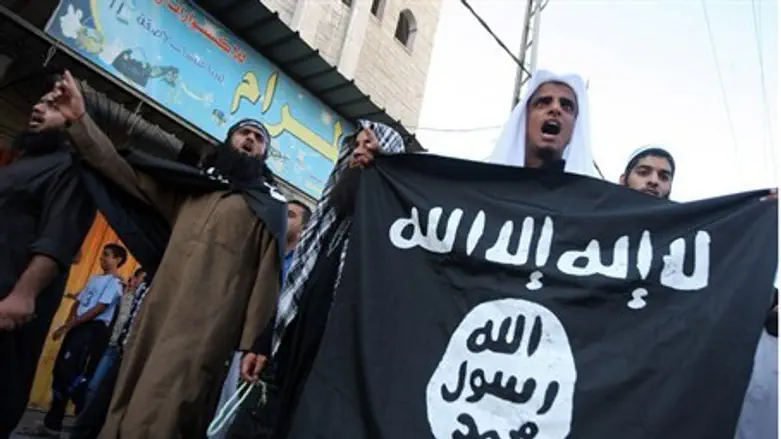 Gaza Salafists wave Al-Qaeda flag during prot