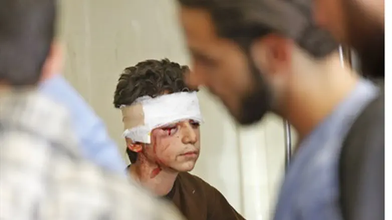 Syrian boy receives treatment after air strik