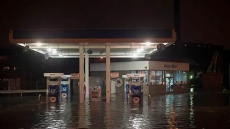  A gas station is submerged in floodwaters in