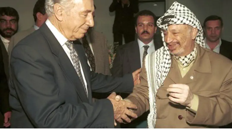 Peres with former PLO Chairman Yasser Arafat