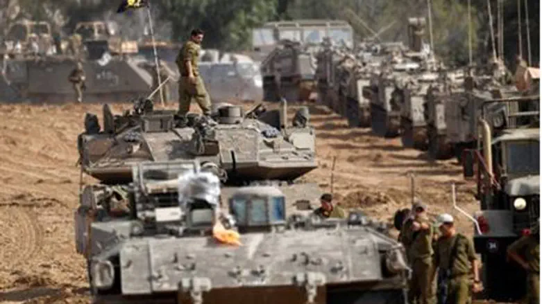  Israeli soldiers prepare armored personnel c