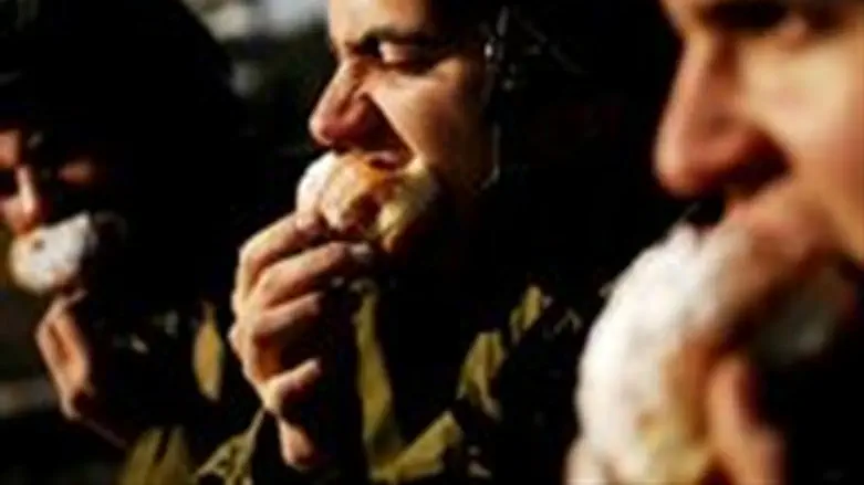 IDF soldiers munch on sufganiy