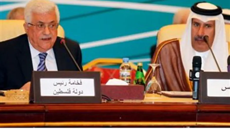 Abbas speaks next to Qatari Prime Minister an