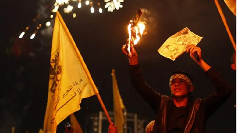 Fatah supporters celebrate in Gaza City