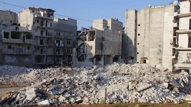 Damaged buildings in the Al-Massir area in Al