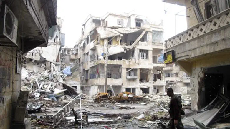 A debris-filled street in Aleppo (file)