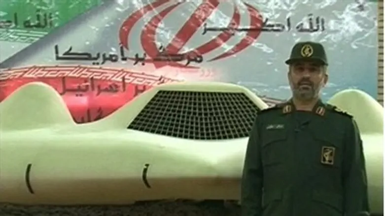 Iranian troops with captured drone (illustration)