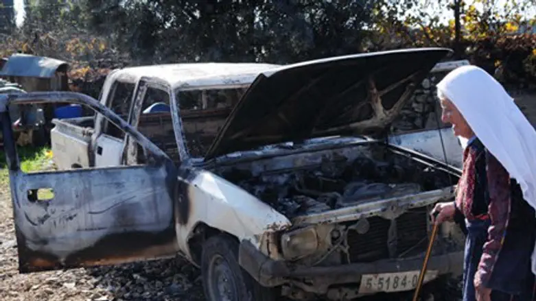 Car damaged by arson (illustrative)
