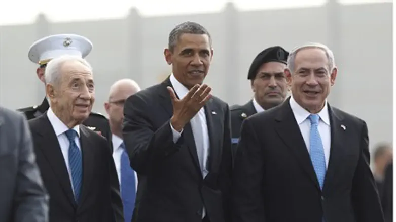 Obama participates in a farewell ceremony wit