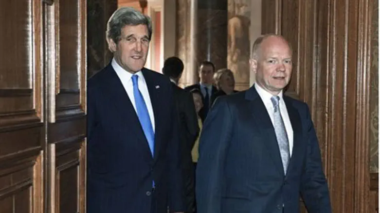 U.S. Secretary of State John Kerry walks with