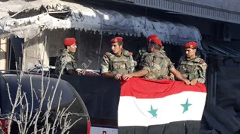 Soldiers loyal to the Syrian 