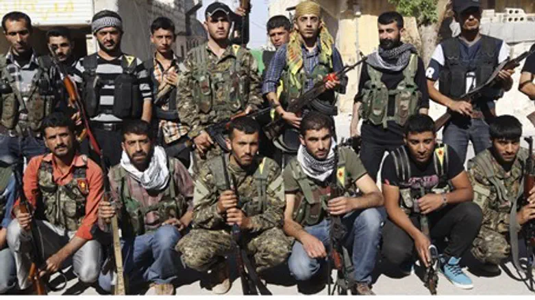 Kurdish YPG fighters (file)