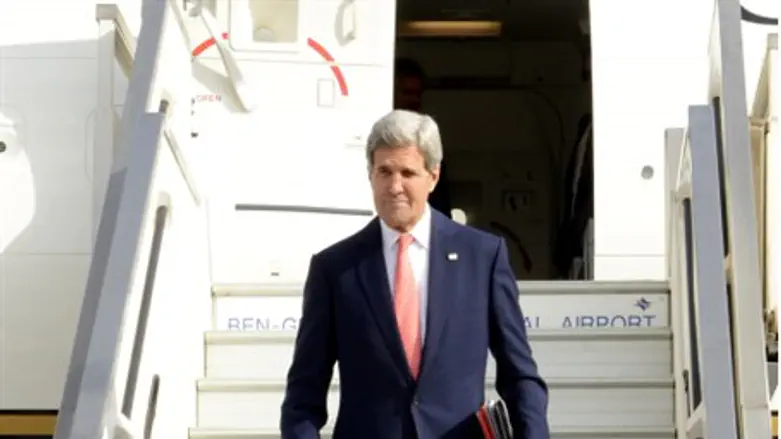 John Kerry, en route to Geneva