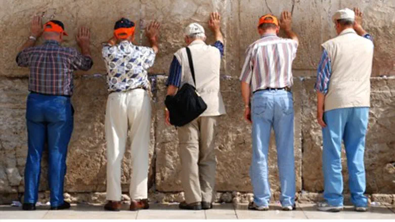 Tourists at Kotel (Western Wall) in Jerusalem