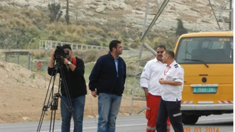 Palestinian film crew at scene of riot